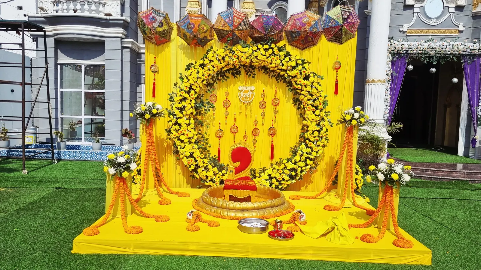 Digha Club Banquet Hall building with a decorated outdoor haldi mandap on the front lawn